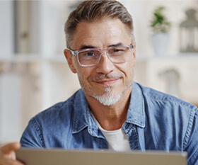 Middle aged man with glasses