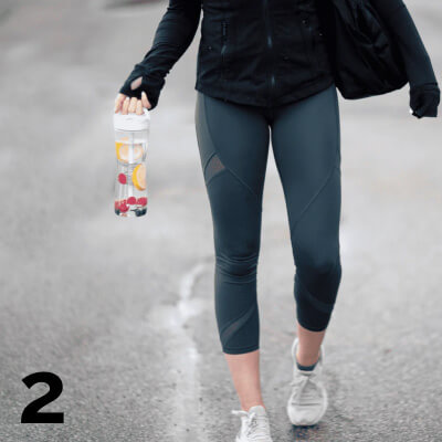 Woman carrying shaker bottle